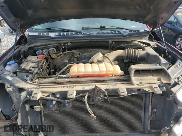2018 Ford F-150 XL z VIN 1FTEW1E5XJFB78673, wystawiony jako Copart lot #61209935 z przebiegiem 69 695 mil mil oraz Szkoda całkowita • Salvage title. Historia ofert i sprzedaży dostępna na DreamBid. Obrazek 11.