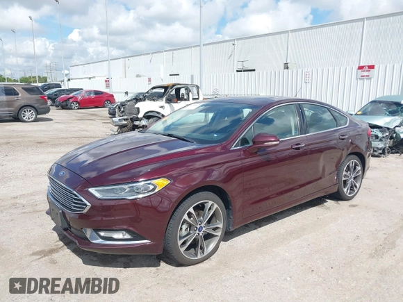 2017 Ford Fusion Titanium with VIN 3FA6P0K97HR214485, listed as a IAAI auction lot 40208619 with 39,265 mi miles and . Bid and sale history available at DreamBid. Image 18.
