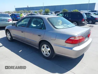 2000 Honda Accord EX with VIN 1HGCG1657YA091101, listed as a IAAI auction lot 42522505 with 152,076 mi miles and . Bid and sale history available at DreamBid. Image 3.