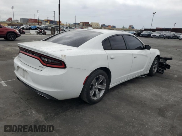 2015 Dodge Charger SXT z VIN 2C3CDXHG7FH721601, wystawiony jako Copart lot #58253925 z przebiegiem 123 004 mil mil oraz Szkoda całkowita • Salvage title. Historia ofert i sprzedaży dostępna na DreamBid. Obrazek 3.