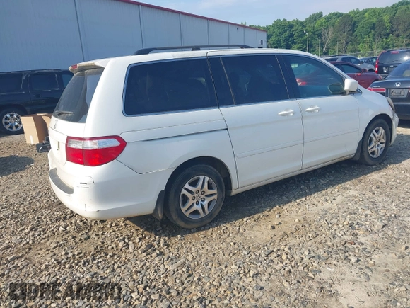 2007 Honda Odyssey EX-L z VIN 5FNRL38617B415770, wystawiony jako IAAI lot #42208632 z przebiegiem 269 375 mil mil oraz . Historia ofert i sprzedaży dostępna na DreamBid. Obrazek 4.