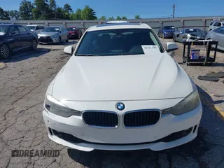 2014 BMW 3 Series 328i with VIN WBA3A5C58EP602669, listed as a IAAI auction lot 42514389 with 187,330 mi miles and . Bid and sale history available at DreamBid. Image 13.