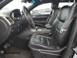 2014 Jeep Grand Cherokee Limited z VIN 1C4RJFBG6EC237437, wystawiony jako Copart lot #43224005 z przebiegiem 159 828 mil mil oraz Szkoda całkowita • Salvage title. Historia ofert i sprzedaży dostępna na DreamBid. Obrazek 7.