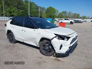 2021 Toyota RAV4 Hybrid XSE with VIN JTME6RFV4MJ008825, listed as a IAAI auction lot 42060148 with 91,129 mi miles and . Bid and sale history available at DreamBid. Image 1.