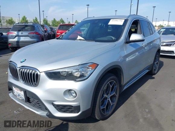 2019 BMW X1 xDrive28i with VIN WBXHT3C56K5L38658, listed as a IAAI auction lot 42496734 with 49,373 mi miles and . Bid and sale history available at DreamBid. Image 17.