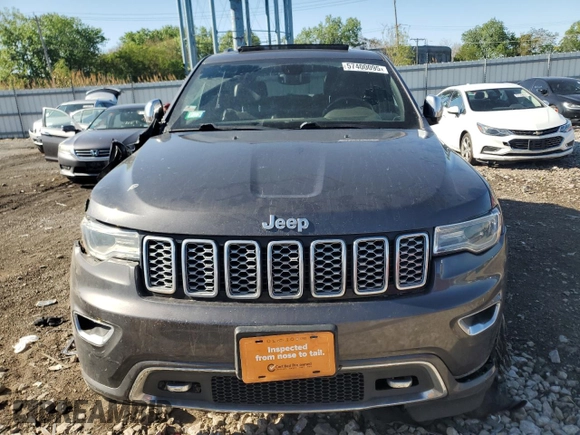 2017 Jeep Grand Cherokee Overland with VIN 1C4RJFCG0HC762612, listed as a Copart auction lot 57400095 with 122,702 mi miles and Salvage title. Bid and sale history available at DreamBid. Image 5.