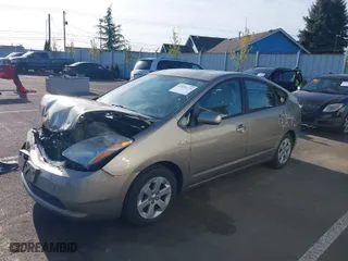2006 Toyota Prius with VIN JTDKB20U867533716, listed as a IAAI auction lot 42036171 with 160,512 mi miles. Bid and sale history available at carsss.com. Image 2.