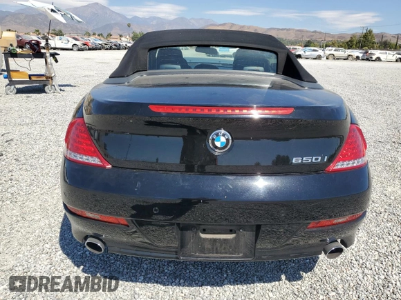 2009 BMW 6 Series 650i with VIN WBAEB53569C224337, listed as a Copart auction lot 68148974 with 75,057 mi miles and Salvage Title. Bid and sale history available at carsss.com. Image 6.