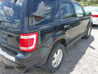 2011 Ford Escape XLT with VIN 1FMCU9D77BKA45274, listed as a IAAI auction lot 42073521 with 245,073 mi miles. Bid and sale history available at carsss.com. Image 4.