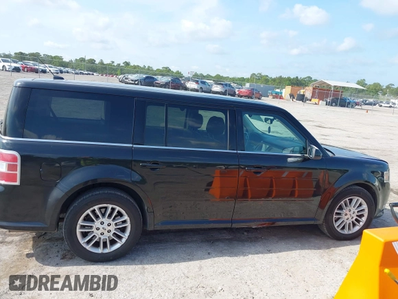 2014 Ford Flex SEL z VIN 2FMGK5C8XEBD13484, wystawiony jako IAAI lot #42235548 z przebiegiem 172 570 mil mil oraz . Historia ofert i sprzedaży dostępna na DreamBid. Obrazek 13.