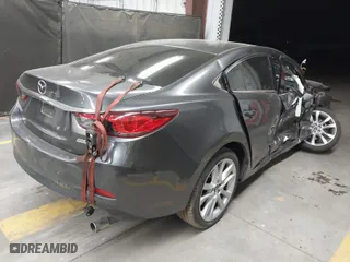 2017 Mazda Mazda6 Touring with VIN JM1GL1V5XH1146167, listed as a IAAI auction lot 41398814 with 59,590 mi miles. Bid and sale history available at carsss.com. Image 4.