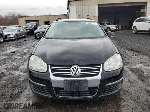 2009 Volkswagen Jetta z VIN 3VWKZ71K09M250143, wystawiony jako Copart lot #82247774 z przebiegiem 156 600 mil mil oraz Szkoda całkowita • Salvage title. Historia ofert i sprzedaży dostępna na DreamBid. Obrazek 5.
