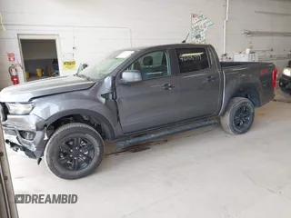 2023 Ford Ranger XL with VIN 1FTER4FH7PLE23750, listed as a IAAI auction lot 42008399 with 52,359 mi miles and . Bid and sale history available at DreamBid. Image 2.