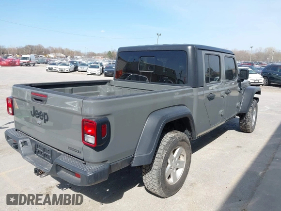 2020 Jeep Gladiator Sport S z VIN 1C6HJTAG7LL154664, wystawiony jako IAAI lot #42033131 z przebiegiem 73 282 mil mil oraz . Historia ofert i sprzedaży dostępna na DreamBid. Obrazek 4.