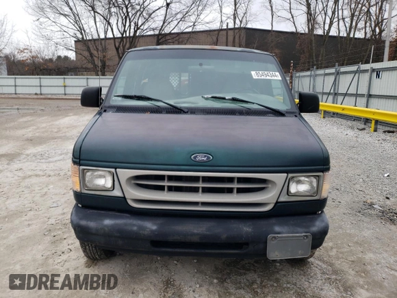 1999 Ford Econoline Cargo with VIN 1FTRE1424XHB64812, listed as a Copart auction lot 85494344 with 197,032 mi miles and Non Repairable. Bid and sale history available at carsss.com. Image 5.