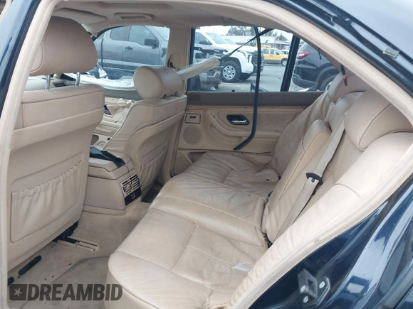 1998 BMW 7 Series with VIN WBAGF8323WDL57406, listed as a IAAI auction lot 42428227 with 93,448 mi miles and . Bid and sale history available at DreamBid. Image 8.