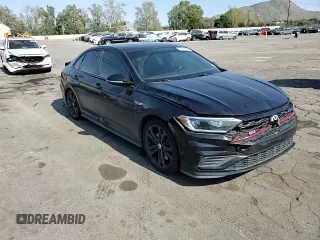 2019 Volkswagen Jetta GLI S with VIN 3VW5T7BU9KM143452, listed as a Copart auction lot 52015965 with 115,652 mi miles and Salvage title. Bid and sale history available at DreamBid. Image 11.