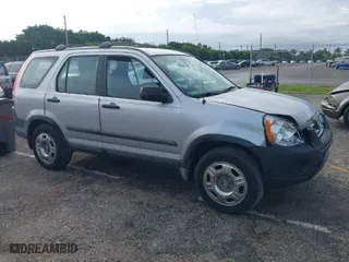 2005 Honda CR-V LX with VIN SHSRD68595U302483, listed as a IAAI auction lot 40528497 with 171,311 mi miles. Bid and sale history available at carsss.com. Image 1.