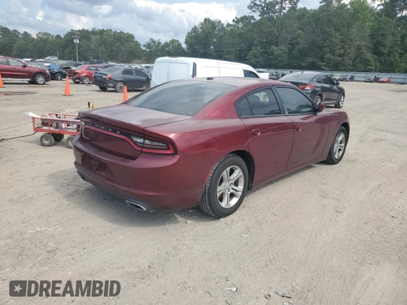2019 Dodge Charger SXT with VIN 2C3CDXBG4KH721185, listed as a Copart auction lot 57872325 with 123,429 mi miles and Salvage title. Bid and sale history available at DreamBid. Image 3.