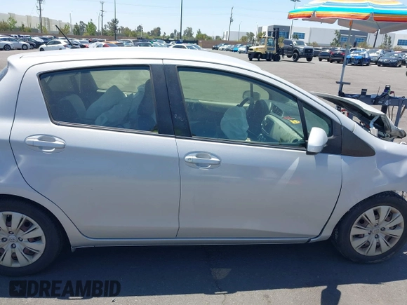 2012 Toyota Yaris L z VIN JTDKTUD3XCD533644, wystawiony jako IAAI lot #42286777 z przebiegiem 149 185 mil mil oraz . Historia ofert i sprzedaży dostępna na DreamBid. Obrazek 12.