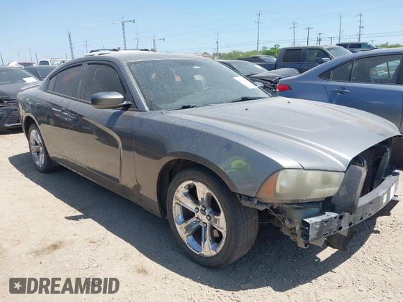 2012 Dodge Charger SE with VIN 2C3CDXBG5CH219805, listed as a IAAI auction lot 42002071 with 238,820 mi miles. Bid and sale history available at carsss.com. Image 1.