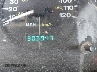 1996 Jeep Grand Cherokee Laredo with VIN 1J4FX58S1TC278511, listed as a IAAI auction lot 41837339 with 303,947 mi miles. Bid and sale history available at carsss.com. Image 7.