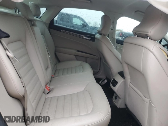 2017 Ford Fusion SE z VIN 3FA6P0H97HR166462, wystawiony jako Copart lot #86265204 z przebiegiem 65 707 mil mil oraz Szkoda całkowita • Salvage title. Historia ofert i sprzedaży dostępna na DreamBid. Obrazek 10.