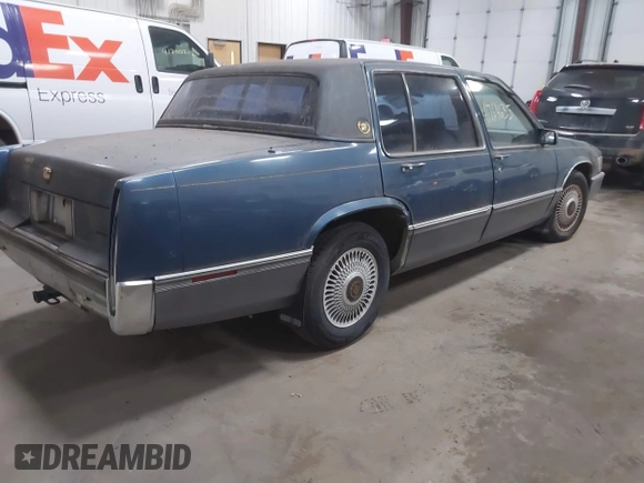 1990 Cadillac DeVille z VIN 1G6CD5331L4293427, wystawiony jako IAAI lot #41764635 z przebiegiem 198 499 mil mil oraz . Historia ofert i sprzedaży dostępna na DreamBid. Obrazek 4.