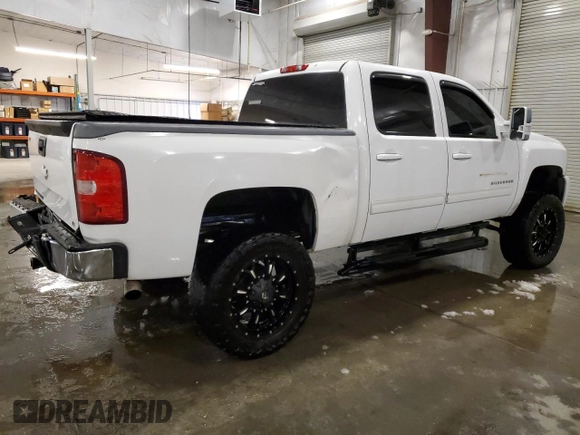 2012 Chevrolet Silverado 1500 LT with VIN 3GCPKSE72CG237017, listed as a Copart auction lot 49901985 with 236,101 mi miles and Salvage Title. Bid and sale history available at DreamBid. Image 3.