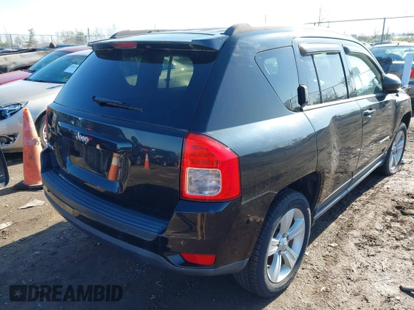 2013 Jeep Compass Sport with VIN 1C4NJDBB4DD113831, listed as a IAAI auction lot 42059122 with 135,062 mi miles. Bid and sale history available at carsss.com. Image 4.