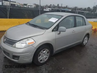 2007 Nissan Versa 1.8 SL with VIN 3N1BC11E97L445174, listed as a IAAI auction lot 41493406 with 75,479 mi miles. Bid and sale history available at carsss.com. Image 2.