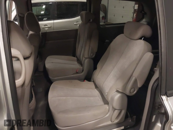 2010 Kia Sedona LX with VIN KNDMG4C35A6330998, listed as a IAAI auction lot 41833978 with 161,452 mi miles. Bid and sale history available at carsss.com. Image 8.