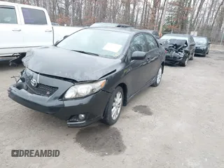 2010 Toyota Corolla with VIN 2T1BU4EEXAC362658, listed as a IAAI auction lot 41713512 with 165,892 mi miles. Bid and sale history available at carsss.com. Image 2.