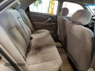 2000 Toyota Camry CE z VIN 4T1BG22K2YU742415, wystawiony jako Copart lot #55763165 z przebiegiem 245 821 mil mil oraz Czysty tytuł • Clean title. Historia ofert i sprzedaży dostępna na DreamBid. Obrazek 10.