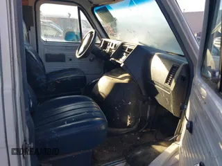 1995 GMC Vandura z VIN 1GTEG25K5SF548518, wystawiony jako IAAI lot #40664471 z przebiegiem 157 506 mil mil oraz . Historia ofert i sprzedaży dostępna na DreamBid. Obrazek 5.