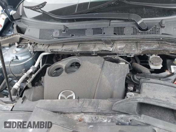 2015 Mazda CX-5 Touring with VIN JM3KE4CY1F0545305, listed as a IAAI auction lot 41234599 with 92,791 mi miles. Bid and sale history available at carsss.com. Image 10.