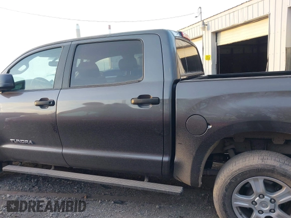 2012 Toyota Tundra 4WD Truck with VIN 5TFDW5F11CX250999, listed as a IAAI auction lot 41087695 with 244,868 mi miles. Bid and sale history available at carsss.com. Image 14.