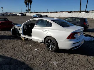 2024 Volvo S60 Plus Dark Theme with VIN 7JRL12FLXRG315532, listed as a Copart auction lot 88744175 with 14,597 mi miles and Salvage title. Bid and sale history available at DreamBid. Image 2.