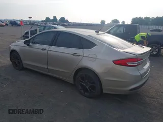 2018 Ford Fusion SE z VIN 3FA6P0HD6JR279927, wystawiony jako IAAI lot #42430172 z przebiegiem 145 080 mil mil oraz . Historia ofert i sprzedaży dostępna na DreamBid. Obrazek 3.