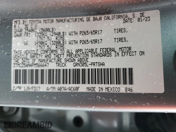 2023 Toyota Tacoma SR with VIN 3TMCZ5AN4PM566647, listed as a Copart auction lot 64062034 with 43,154 mi miles and Salvage title. Bid and sale history available at DreamBid. Image 14.