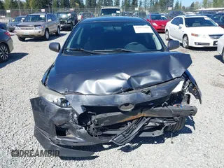 2010 Toyota Corolla with VIN 1NXBU4EE2AZ171959, listed as a IAAI auction lot 42075409 with 190,019 mi miles and . Bid and sale history available at DreamBid. Image 12.