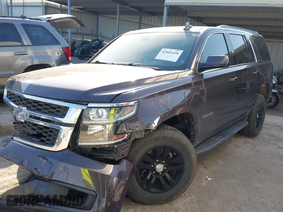 2015 Chevrolet Tahoe LS with VIN 1GNSCAKCXFR628303, listed as a IAAI auction lot 42002698 with 152,141 mi miles and . Bid and sale history available at DreamBid. Image 17.