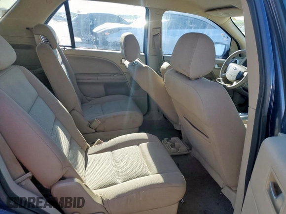 2005 Ford Freestyle SE z VIN 1FMZK01175GA28106, wystawiony jako Copart lot #56126035 z przebiegiem 121 936 mil mil oraz Szkoda całkowita • Salvage title. Historia ofert i sprzedaży dostępna na DreamBid. Obrazek 11.