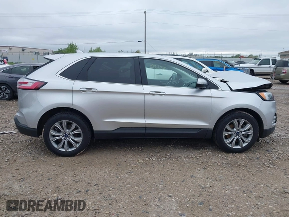 2019 Ford Edge Titanium with VIN 2FMPK4K99KBB56336, listed as a IAAI auction lot 42282600 with 52,422 mi miles and . Bid and sale history available at DreamBid. Image 14.