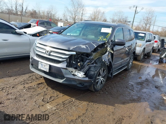 2017 Honda Pilot EX-L with VIN 5FNYF5H53HB029780, listed as a IAAI auction lot 41667838 with 104,803 mi miles. Bid and sale history available at carsss.com. Image 2.