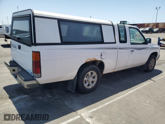 1997 Nissan Frontier XE with VIN 1N6SD16S3VC427137, listed as a Copart auction lot 57911575 with 228,542 mi miles and Clean title. Bid and sale history available at DreamBid. Image 3.