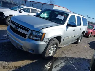 2010 Chevrolet Suburban LS with VIN 1GNUKHE31AR165699, listed as a IAAI auction lot 41509508 with 260,762 mi miles. Bid and sale history available at carsss.com. Image 2.