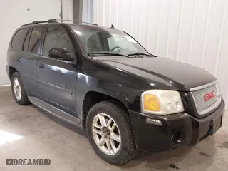 2006 GMC Envoy Denali with VIN 1GKET63M662310282, listed as a IAAI auction lot 41367523 with 216,451 mi miles. Bid and sale history available at carsss.com. Image 1.