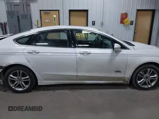 2016 Ford Fusion Titanium with VIN 3FA6P0SU8GR259163, listed as a IAAI auction lot 41812294 with 151,002 mi miles and . Bid and sale history available at DreamBid. Image 13.