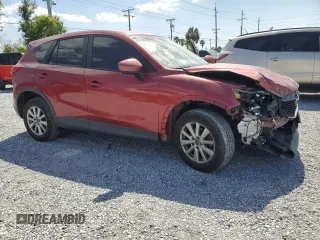 2013 Mazda CX-5 Sport with VIN JM3KE2BEXD0139032, listed as a Copart auction lot 55019325 with 108,555 mi miles and Salvage title. Bid and sale history available at DreamBid. Image 4.